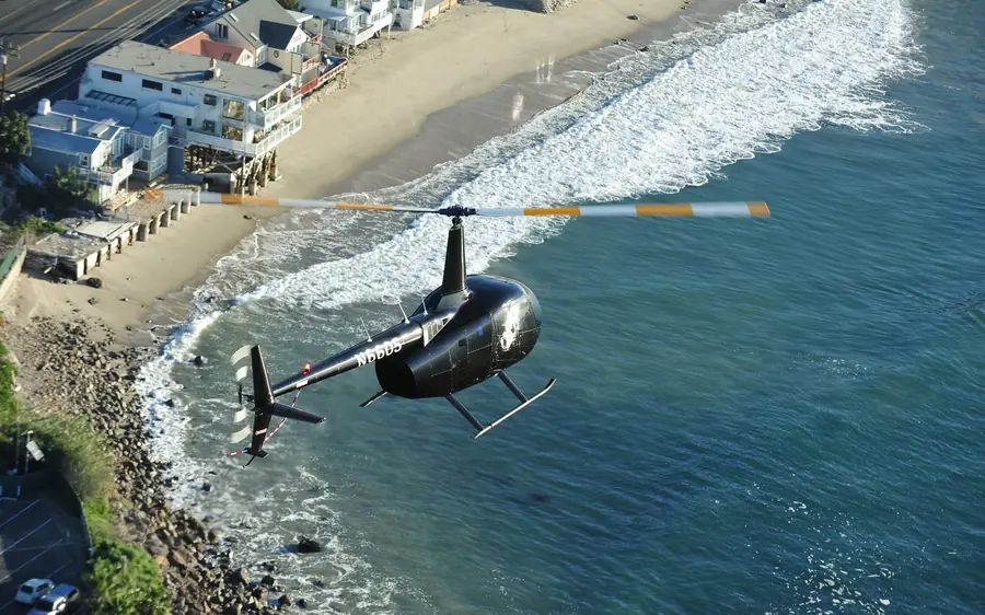 A helicopter over the Malibu coastline in California
